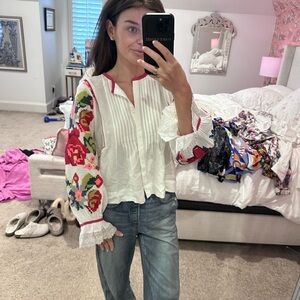 Elegant White Blouse with Colorful Floral Sleeves